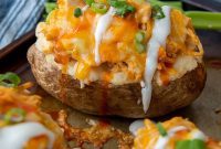 Loaded Buffalo Chicken Baked Potatoes