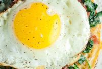 Crispy Farinata Pizza with Prosciutto, Fresh Spinach, and a Fried Egg