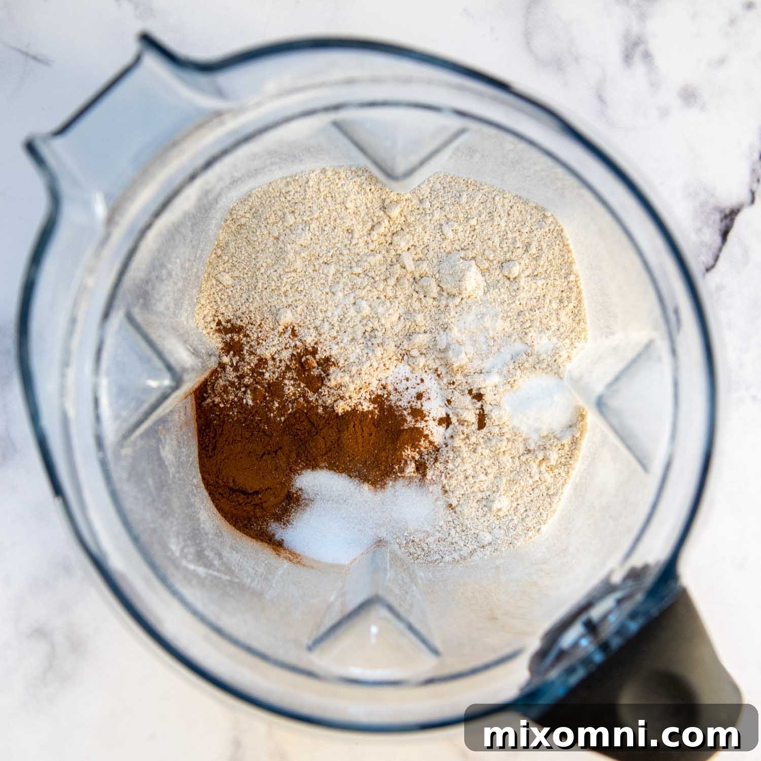 the dry ingredients in a blender.