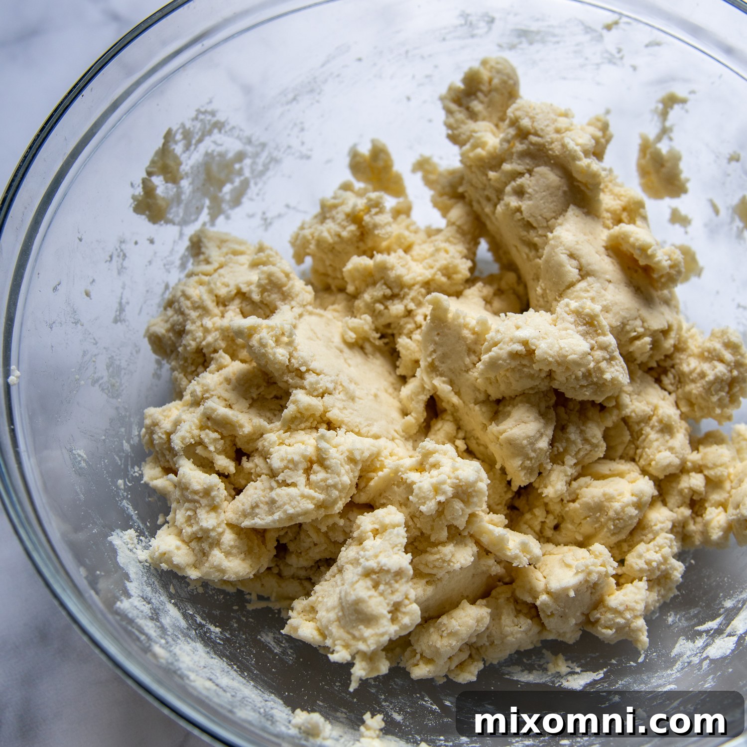 biscuit dough in a large glass bowl.