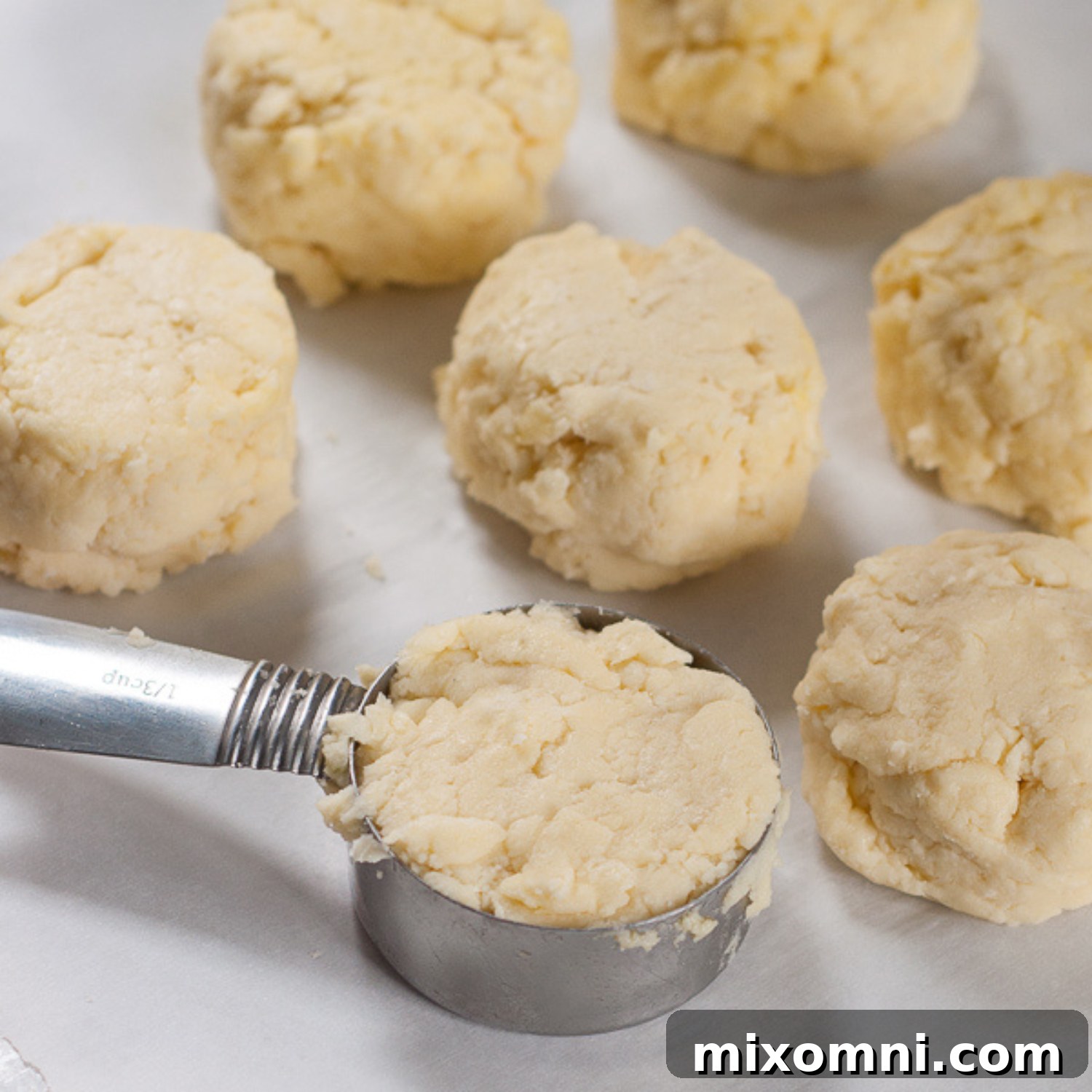 the dough in a measuring cup.