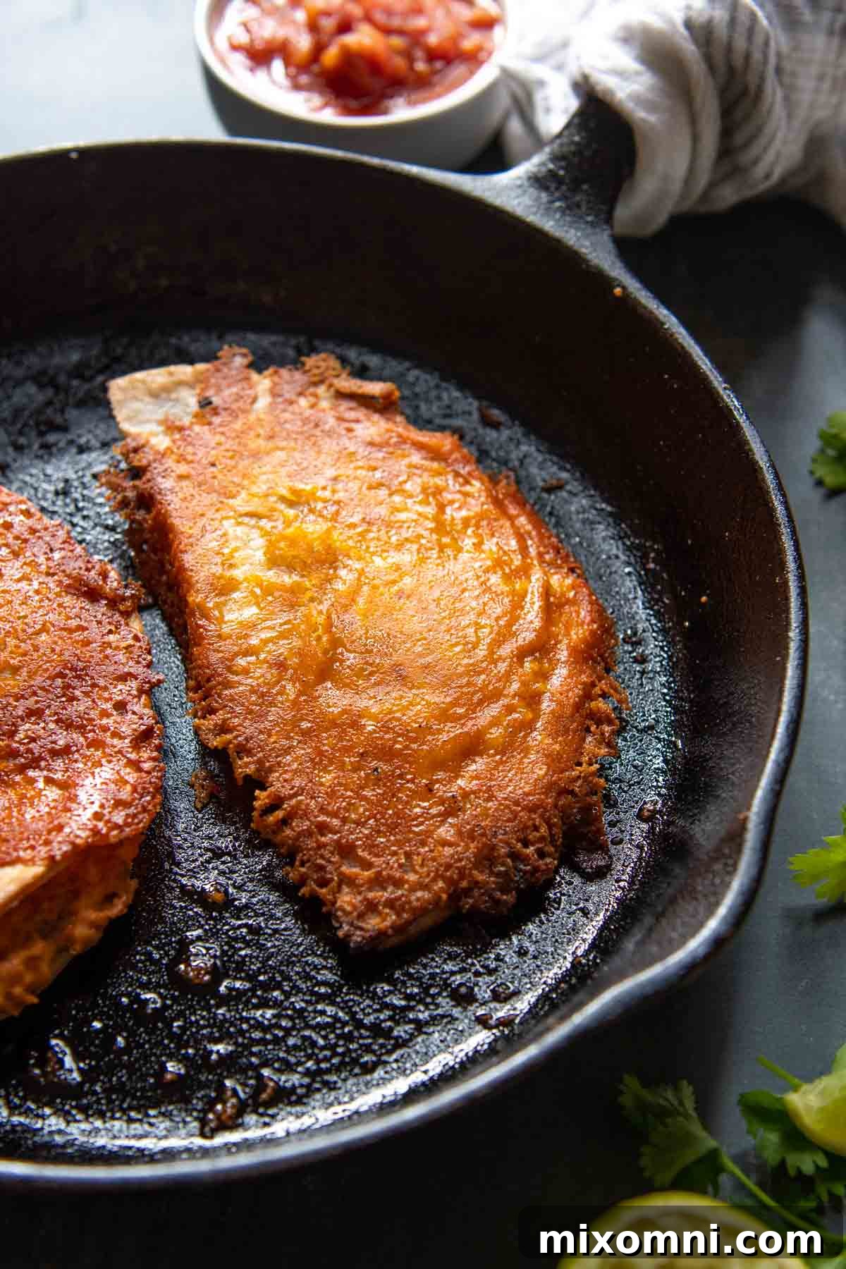 a quesadilla in a frying pan.
