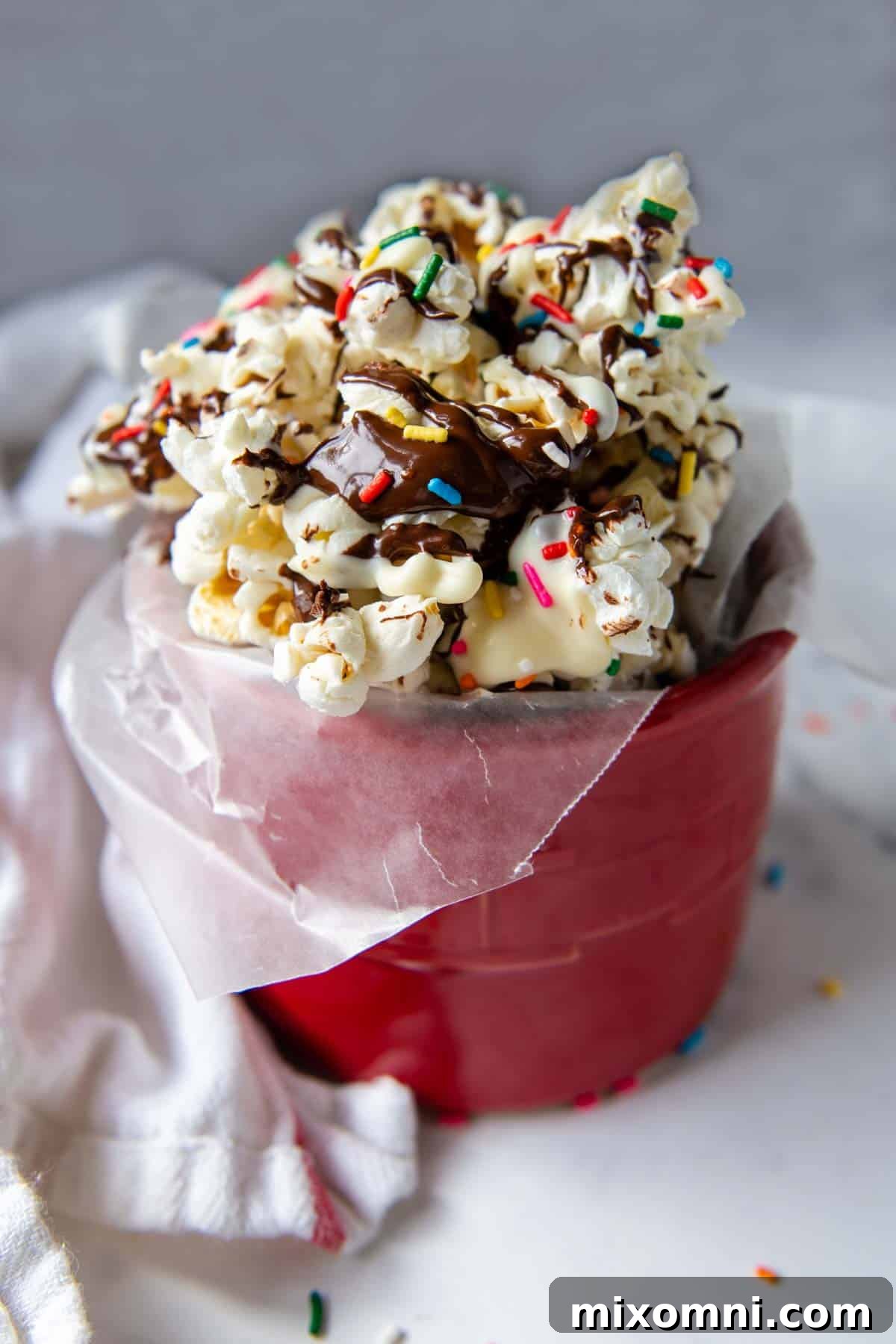 close up of chocolate popcorn with sprinkles.
