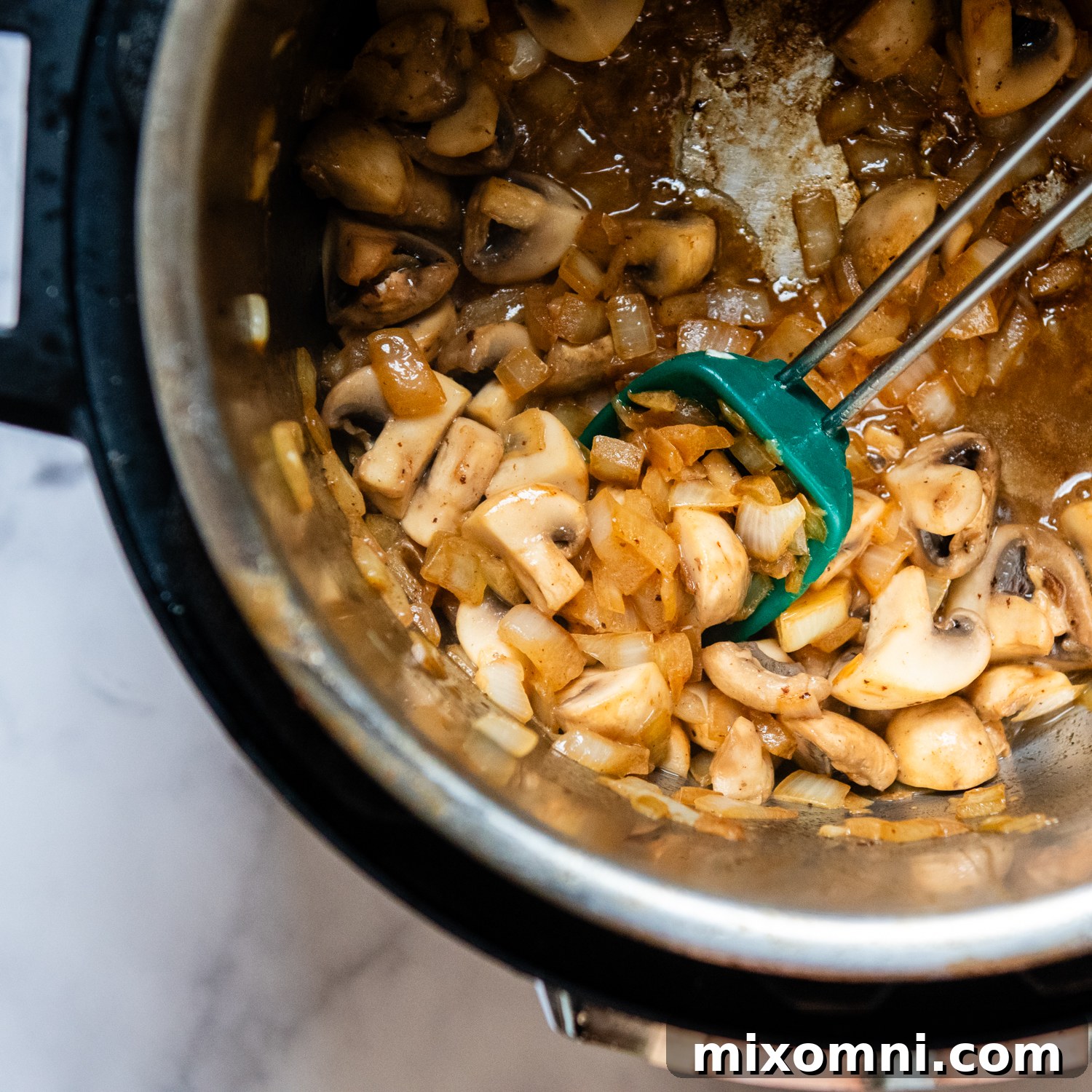 mushrooms and onions in an Instant Pot.