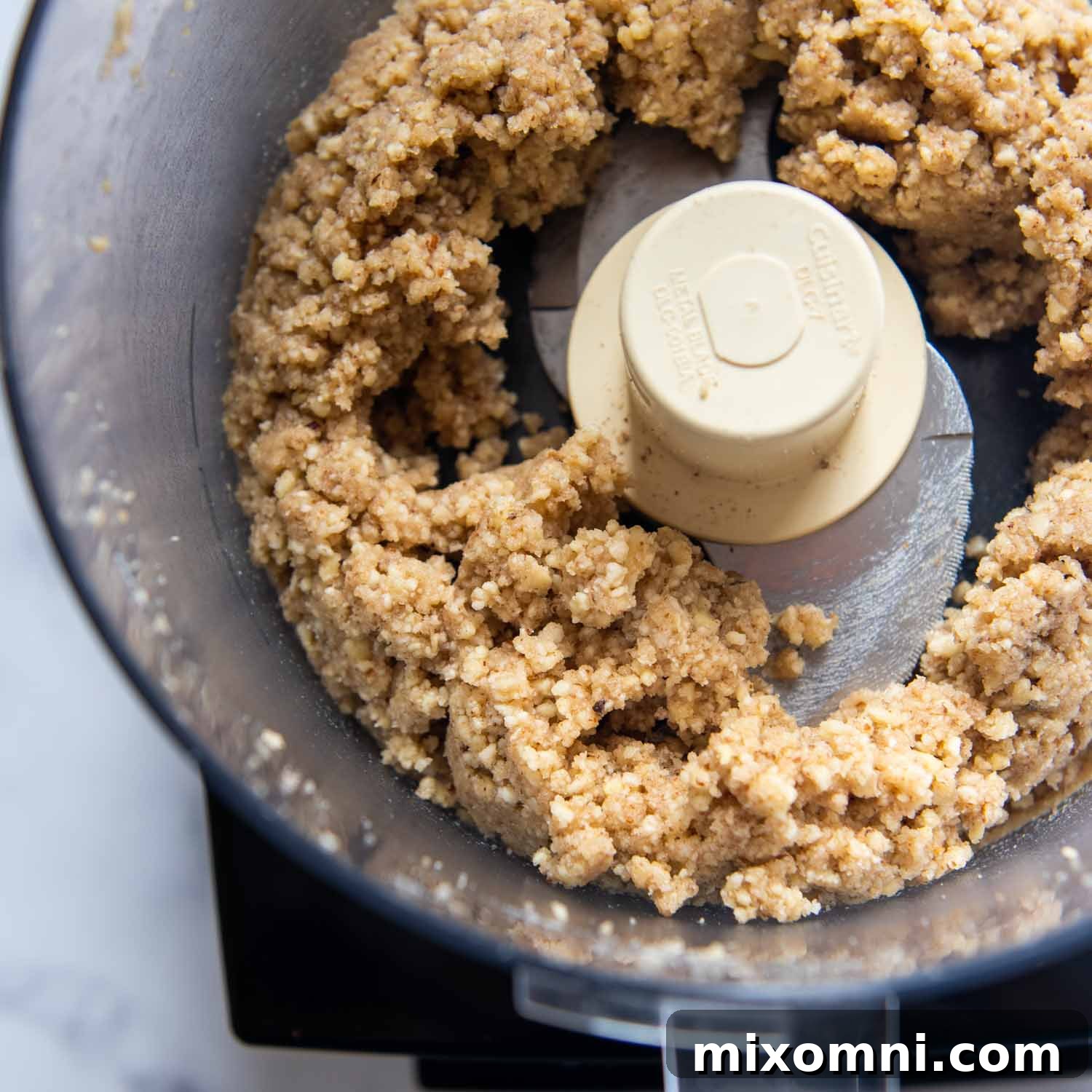 the ingredients combine together in a food processor.