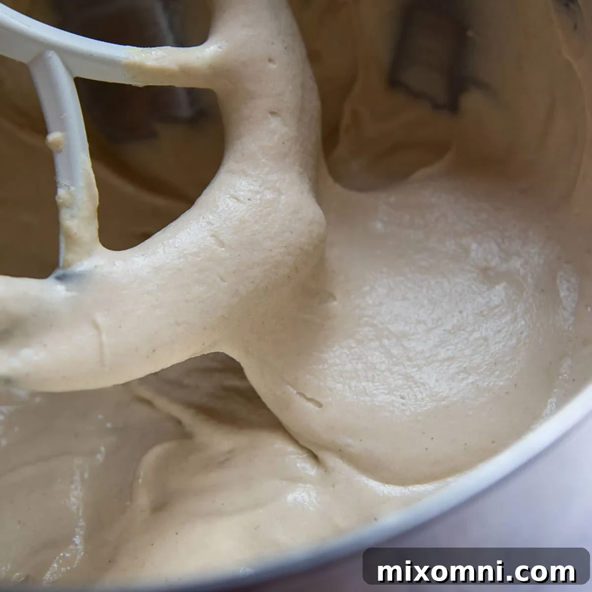 Image showing the slightly runny yet cohesive consistency of the gluten-free bread dough after beating.