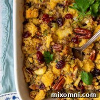 a large spoon scooping into gluten free cornbread stuffing