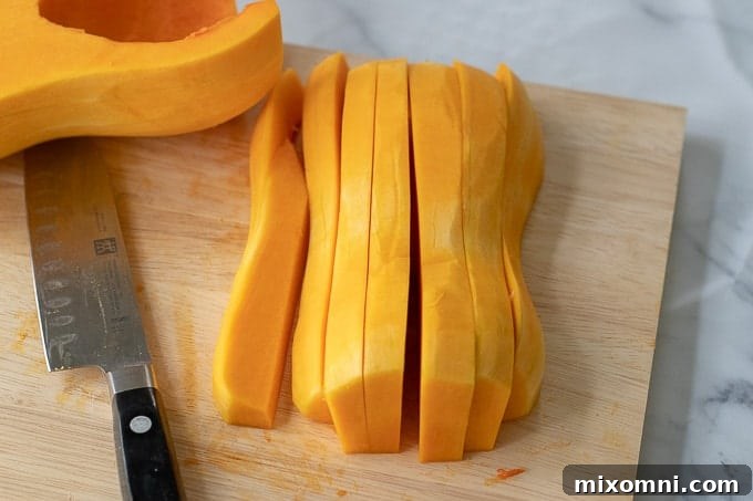 pictures showing how to cut a butternut squash step 2