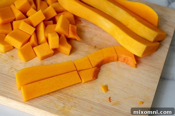pictures showing how to cut a butternut squash step 3