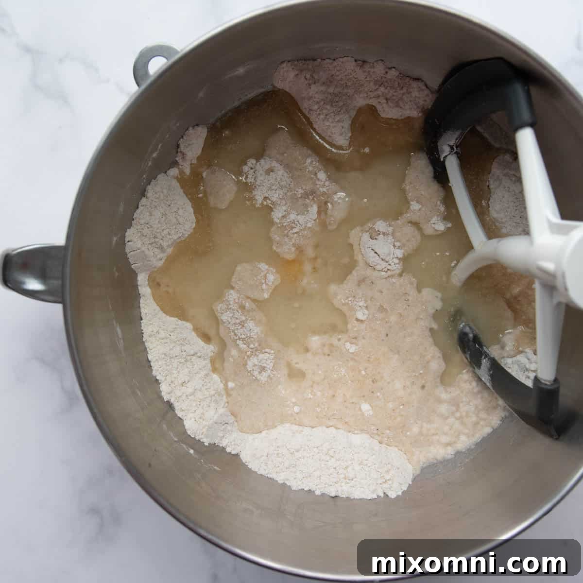 All the dry ingredients for challah in a large mixing bowl, ready to be combined.