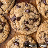 flat lay of chocolate chip cookies on a brown background