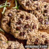 An overhead shot of soft and chewy zucchini cookies adorned with perfectly melted chocolate chips.