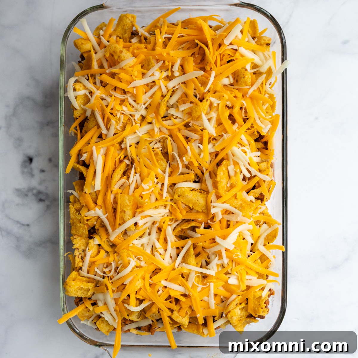 the casserole with Fritos and cheese on top before baking.