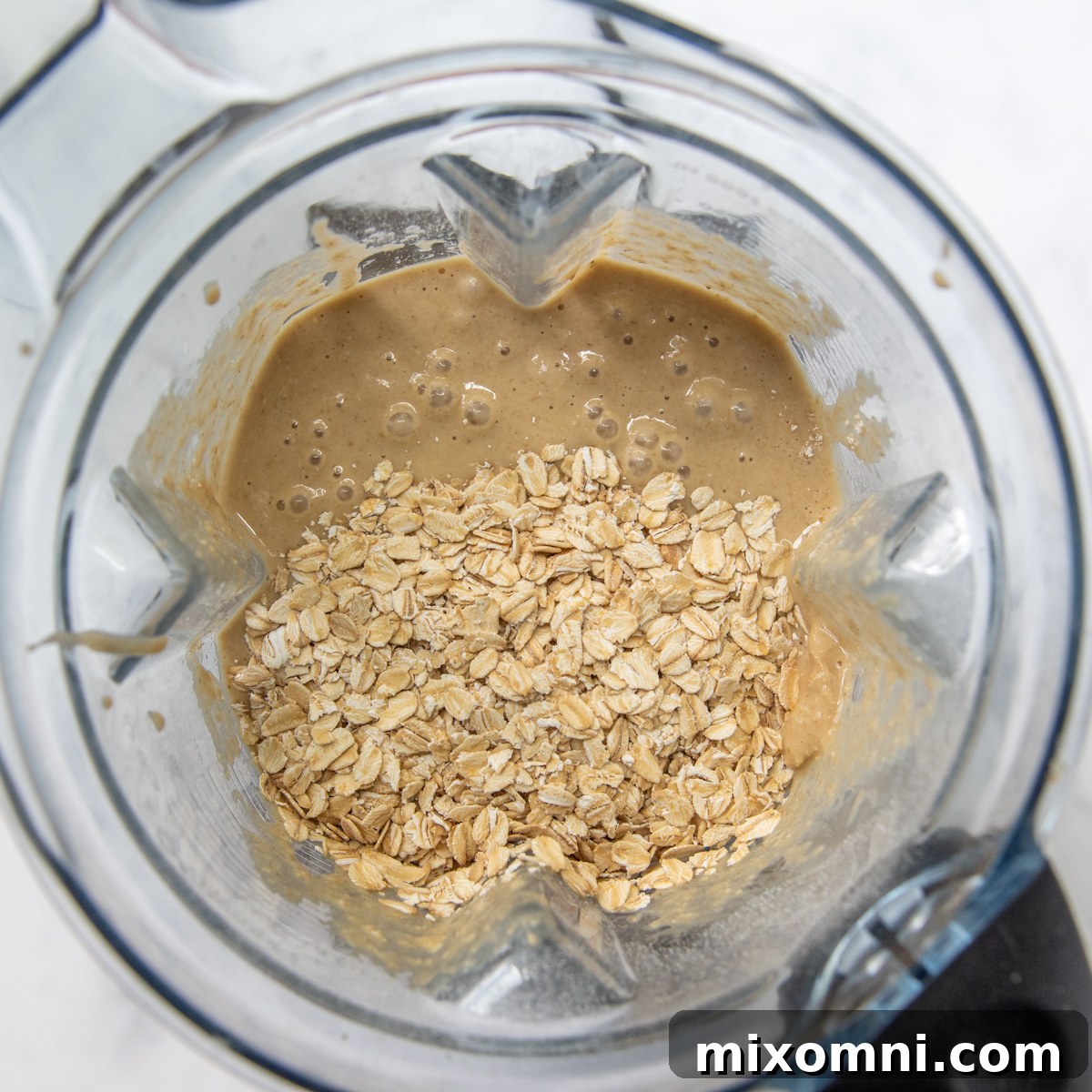 oatmeal added to the bread batter in the blender.
