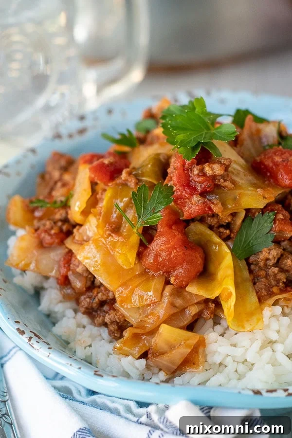 a close up shot of unstuffed cabbage rolls in a small serving bowl