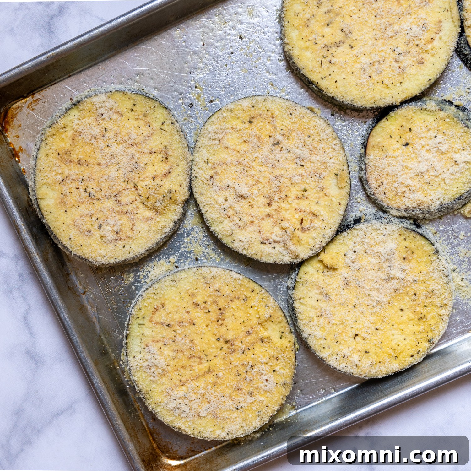 breaded eggplant before baking.