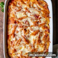 overhead shot of baked ziti in a white baking dish