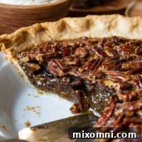 close up of pecan pie sliced into