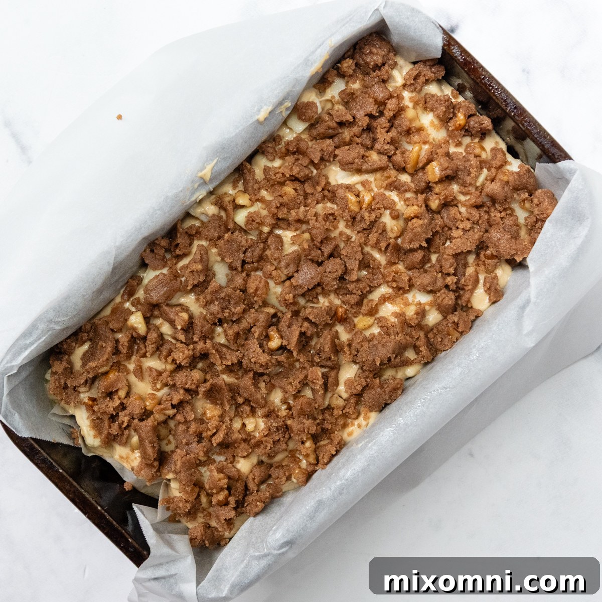 unbaked bread with crumb topping.