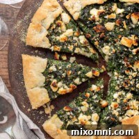 an overhead shot of vegetable tart cut into slices