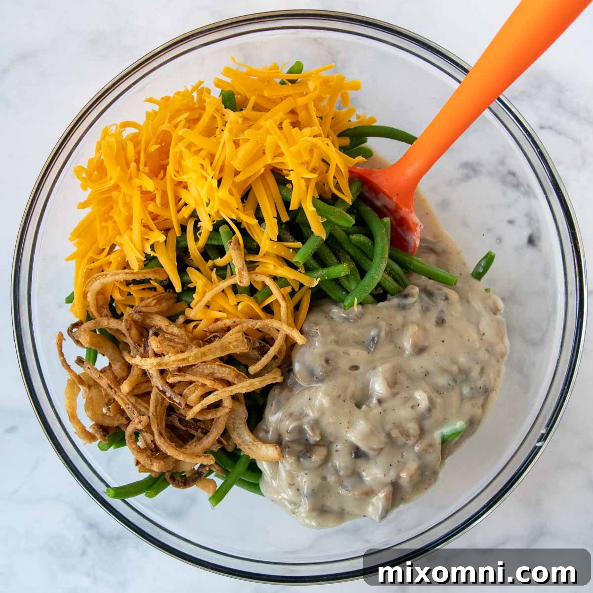 Ingredients for the casserole in a glass bowl.