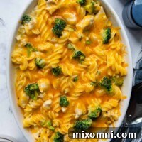 overhead shot of chicken broccoli pasta casserole with melted cheese on top