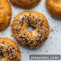 overhead shot of bagels on a white background.