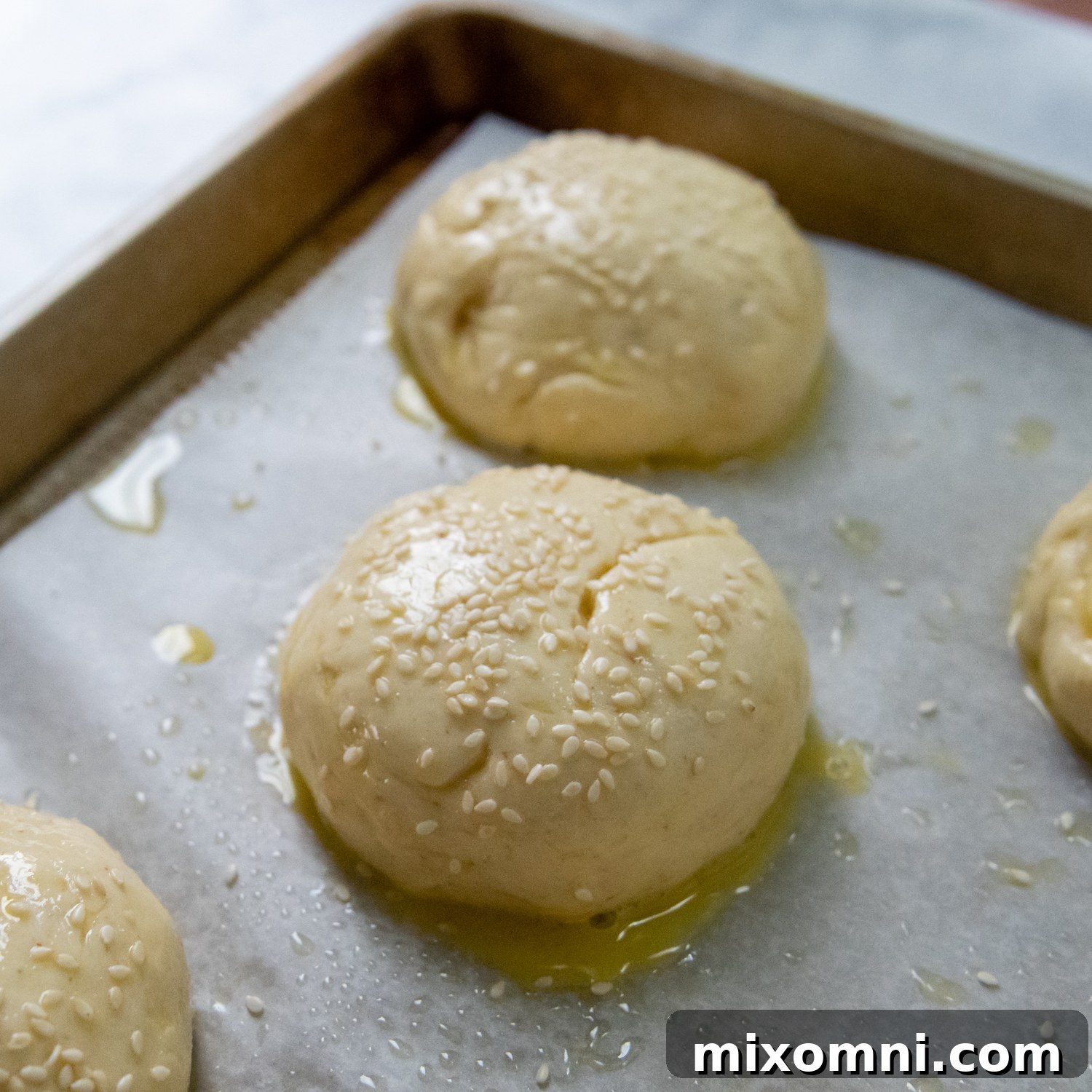 hamburger buns with egg wash brushed on after rising.