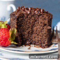 a mug cake with a bite taken out to see the inside.