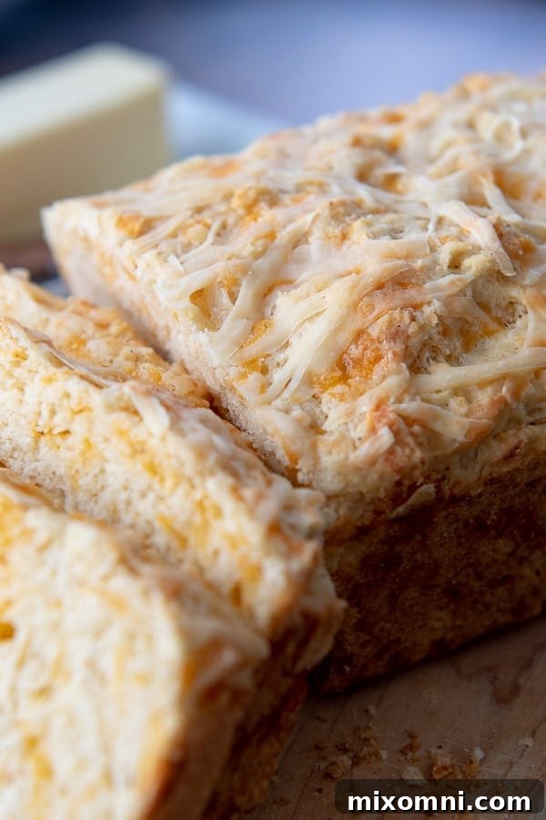 an up close shot of the top of quick cheese bread