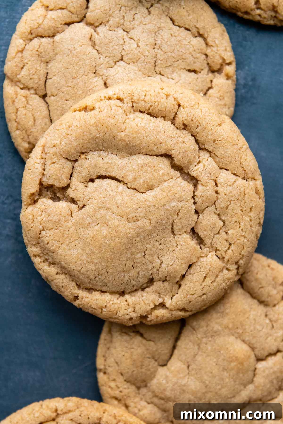 gluten free peanut butter cookie on stack of others.