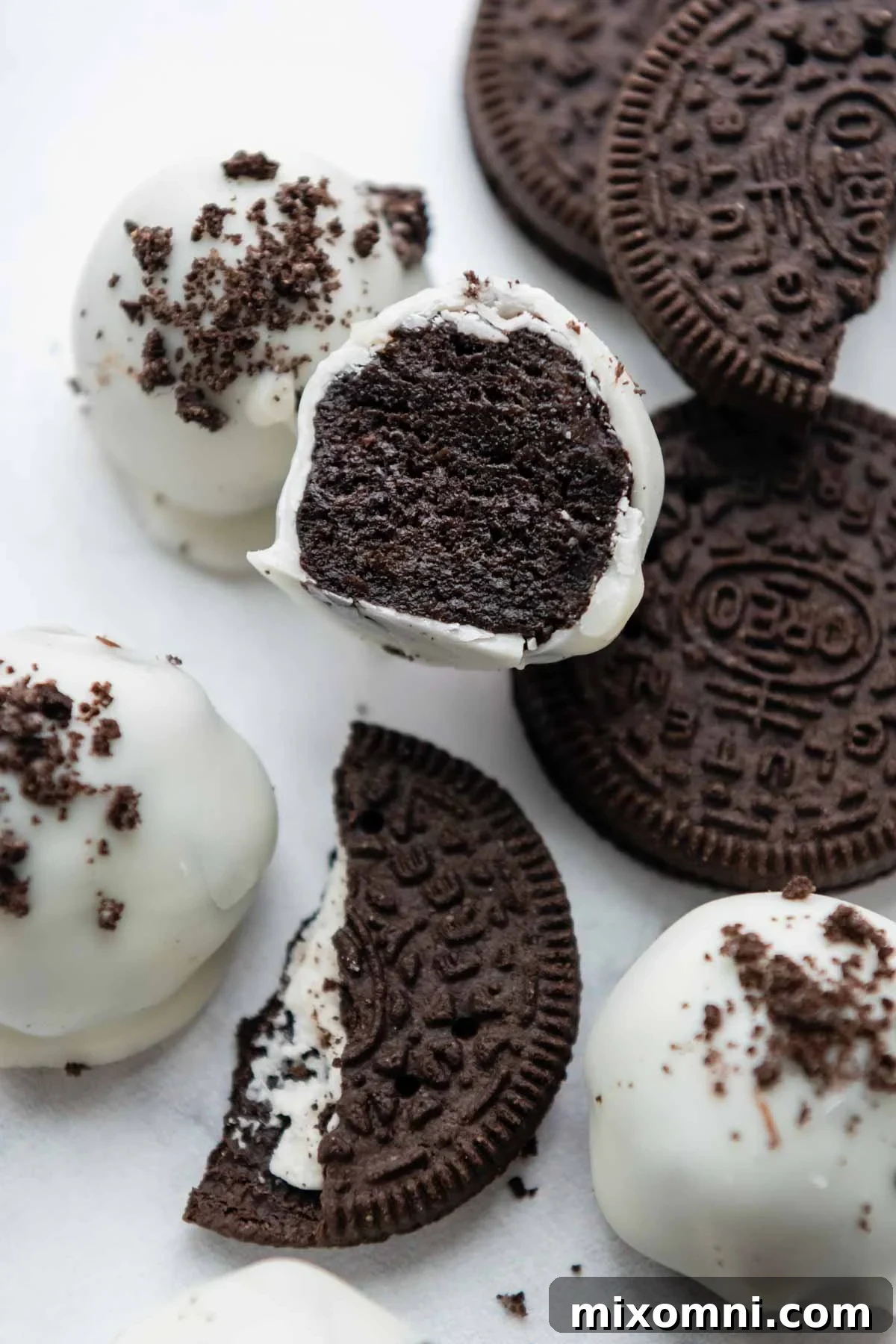 an oreo ball cut in half and facing straight on.