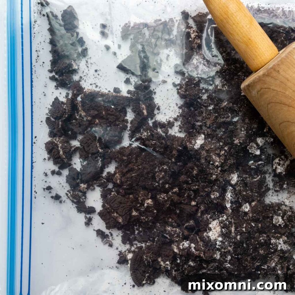 a rolling pin crushing oreos
