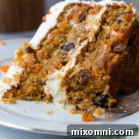 a close up of a bite taken out of a cake slice.