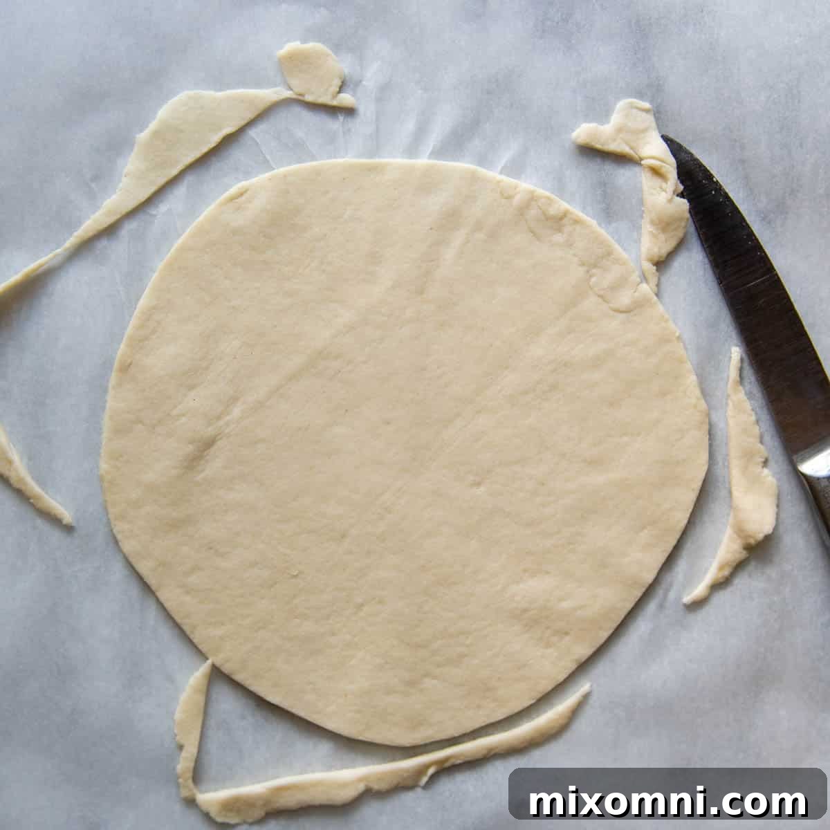 The edges of a rolled gluten-free tortilla neatly trimmed to form a perfect circular shape, minimizing waste.
