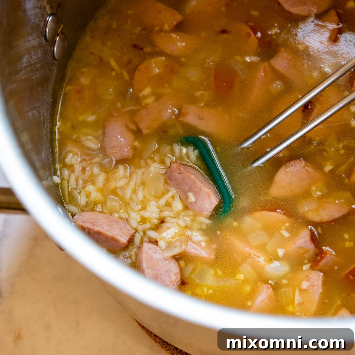 broth and rice added to the soup.