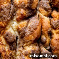 close up of the top of bread with cinnamon swirl.