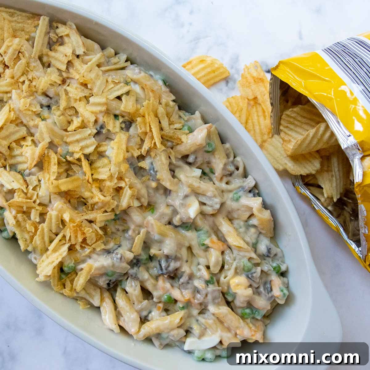 unbaked tuna casserole with potato chips on top.