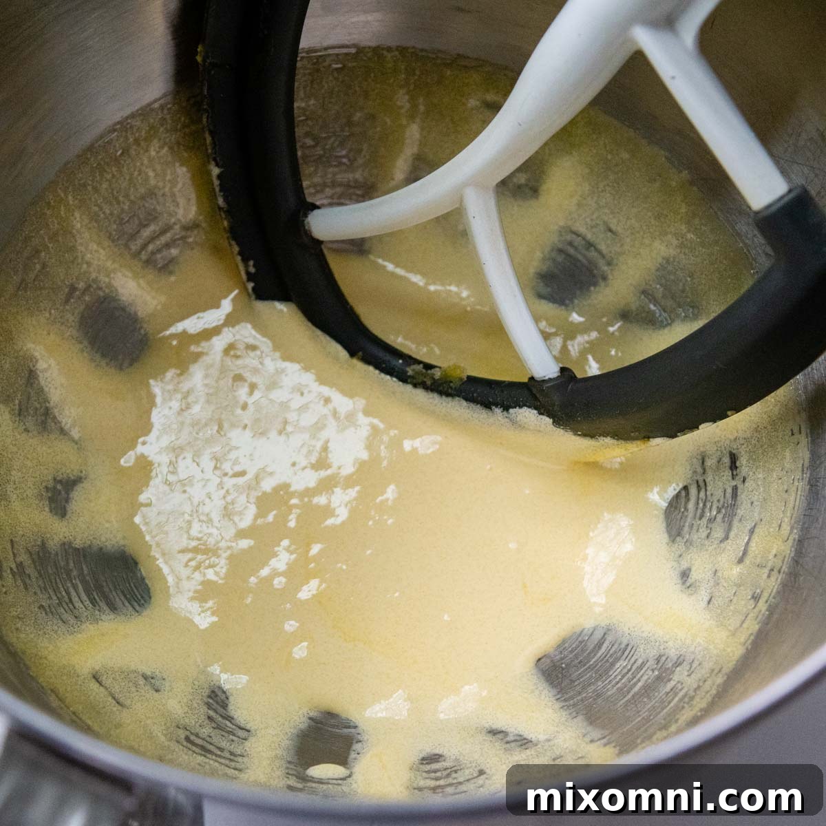 Egg yolks beaten with half the sugar until thick and pale in a mixing bowl.