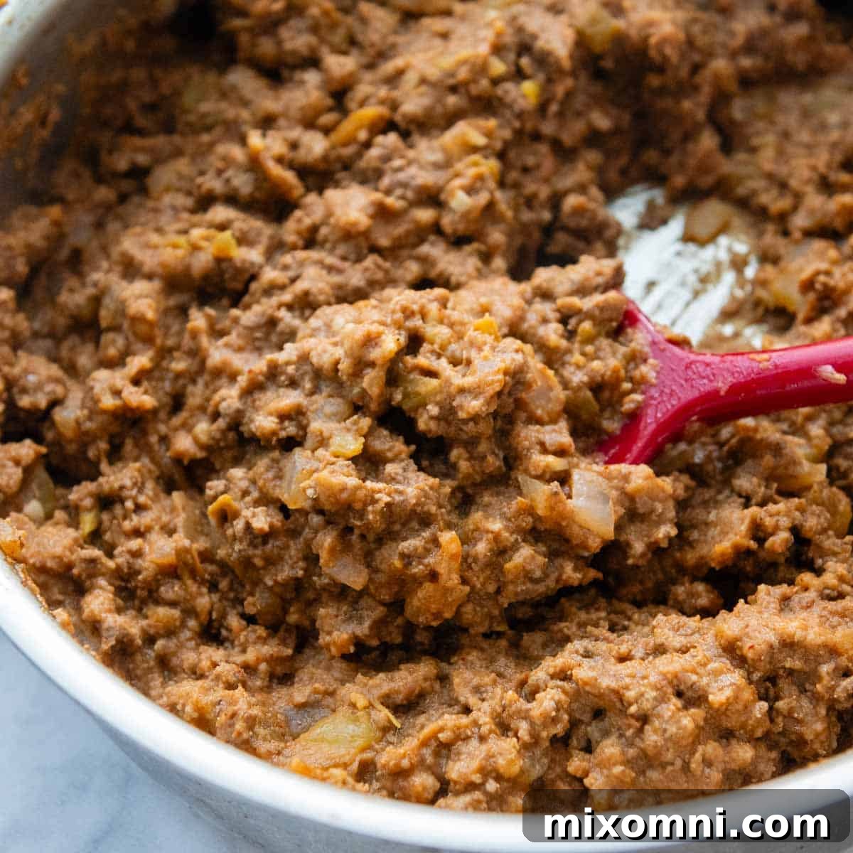 the bean and beef filling in a skillet.