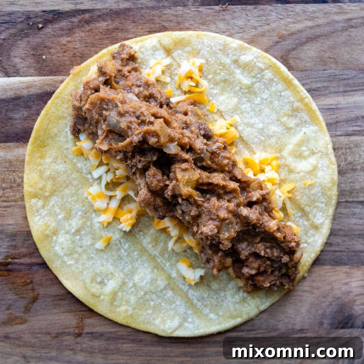 the tortilla with cheese and beef fixture inside.
