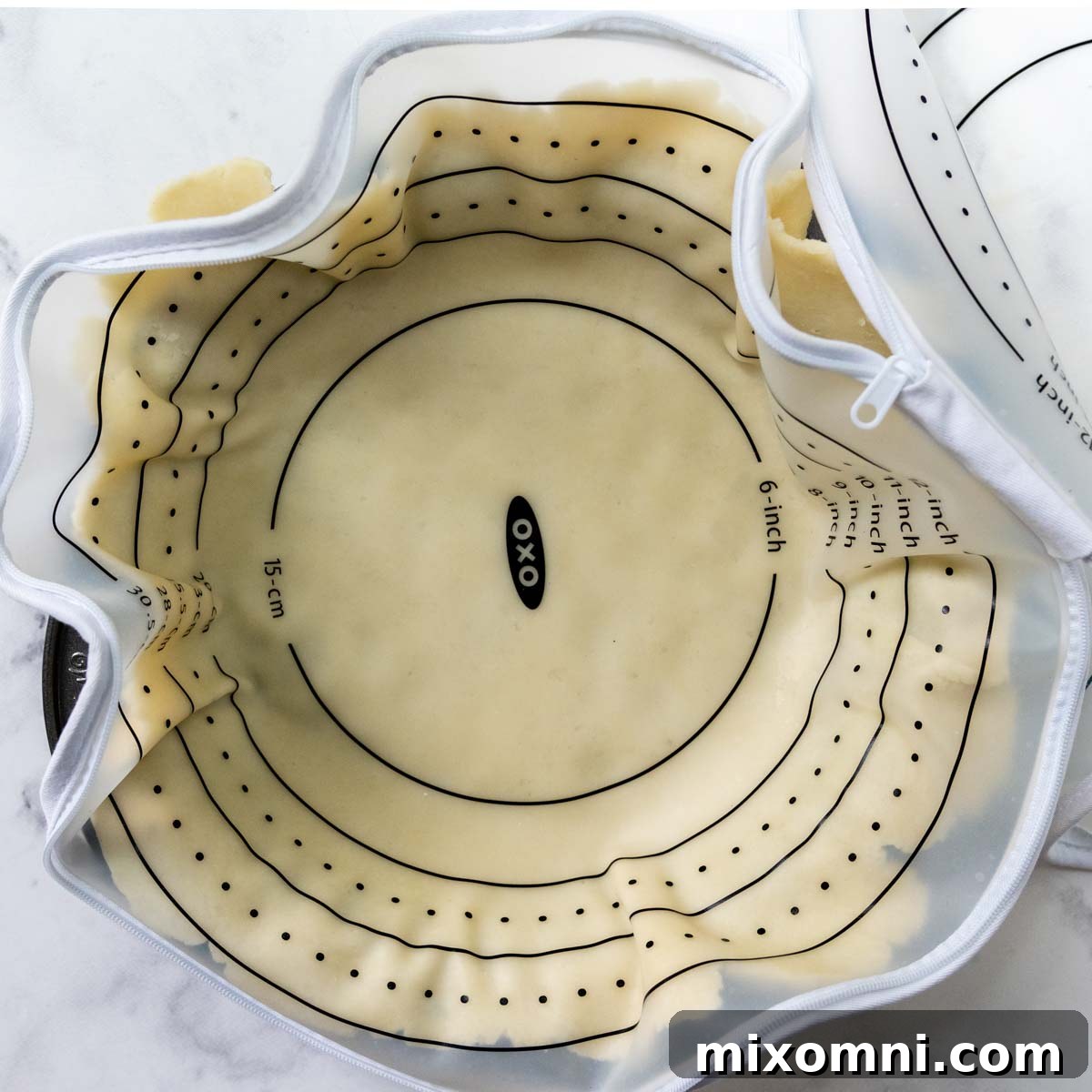 The perfectly shaped gluten-free pie crust nestled in a pie dish, ready for filling.