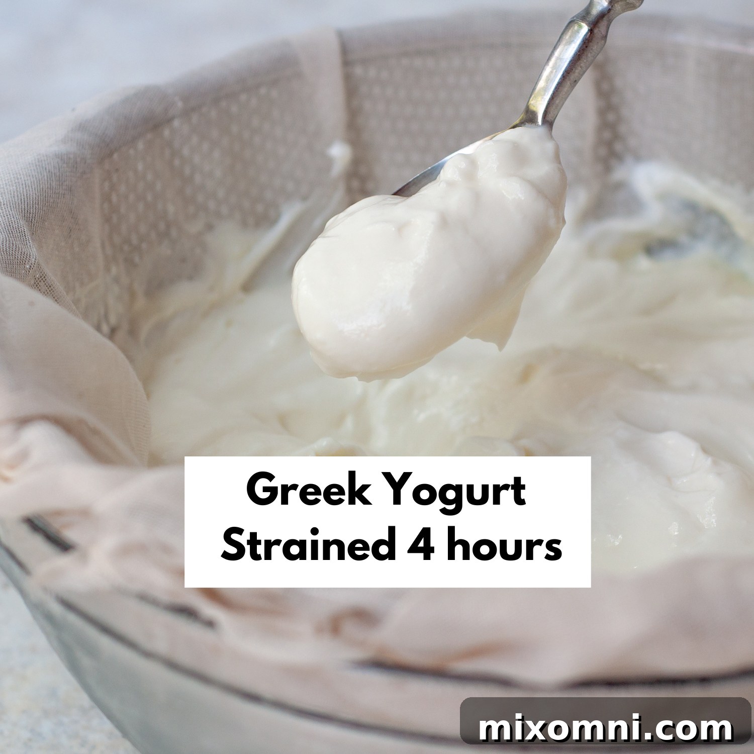 A bowl of yogurt after straining for 4 hours, demonstrating a much thicker, Greek-style consistency.