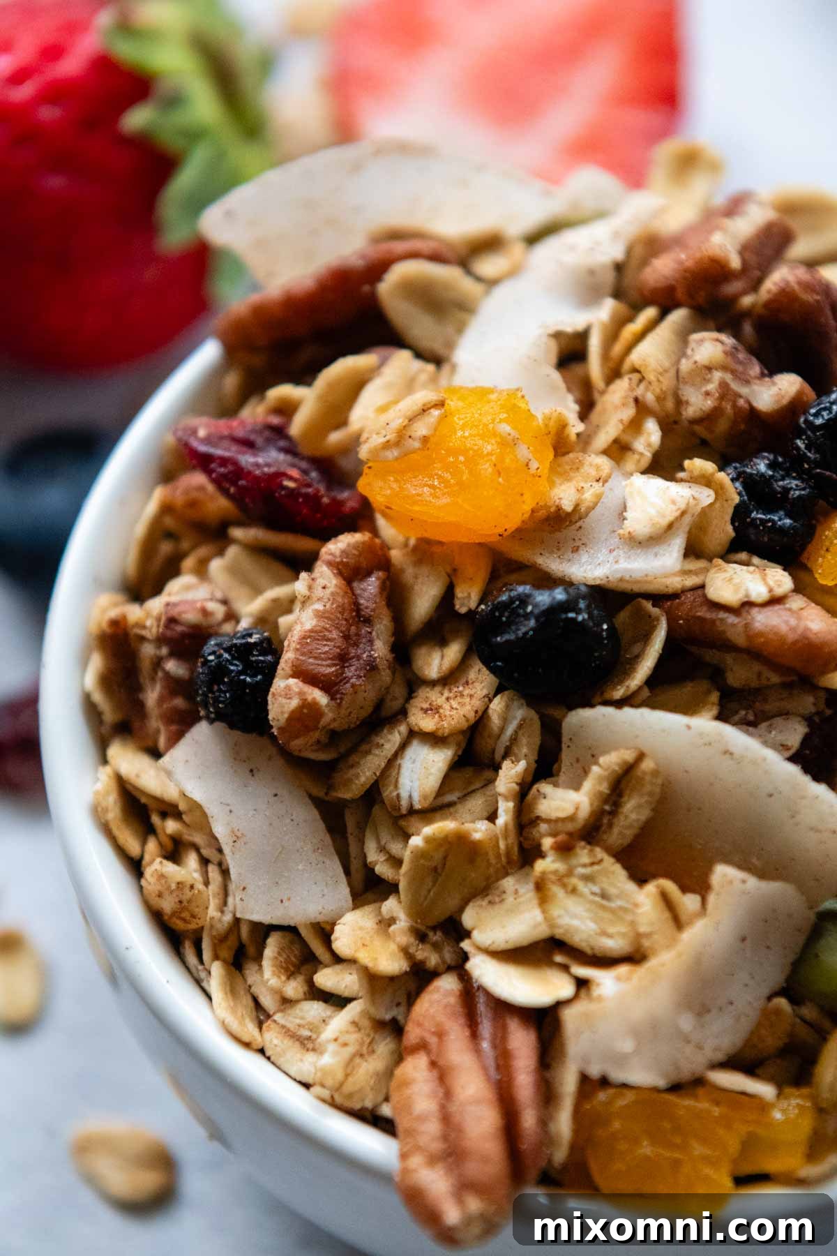 a bowl of muesli with dried fruits and nuts.