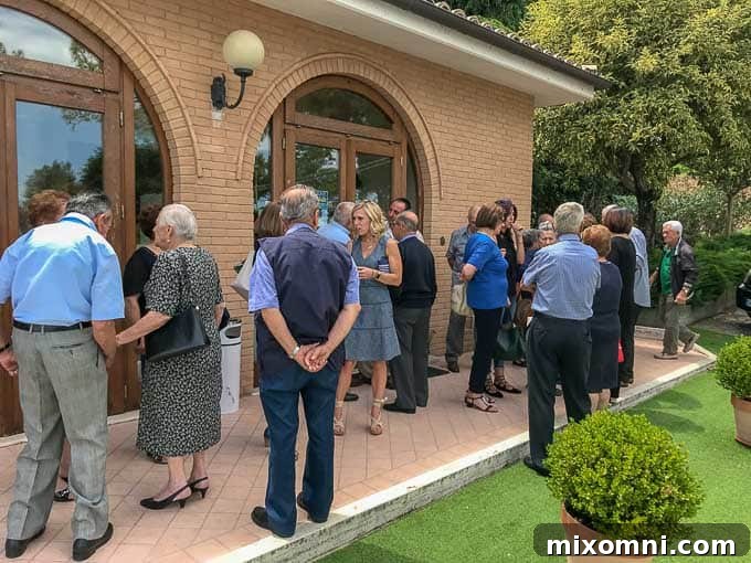 Scenic view of an Italian village nestled among rolling hills, showcasing the country's breathtaking landscape.