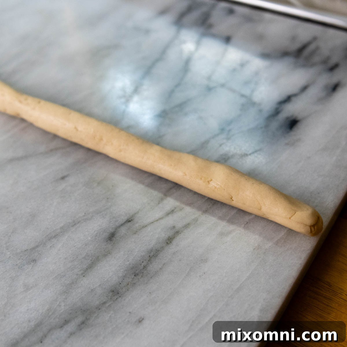 dough rolled into a long line.