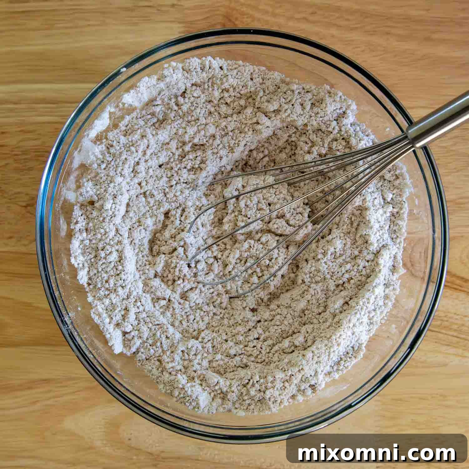whisking dry ingredients together.