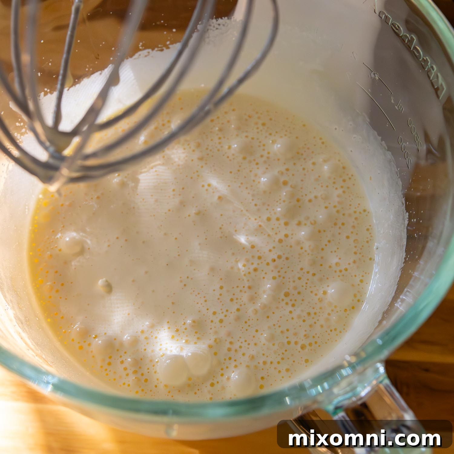 beating eggs with sugar until pale and fluffy.
