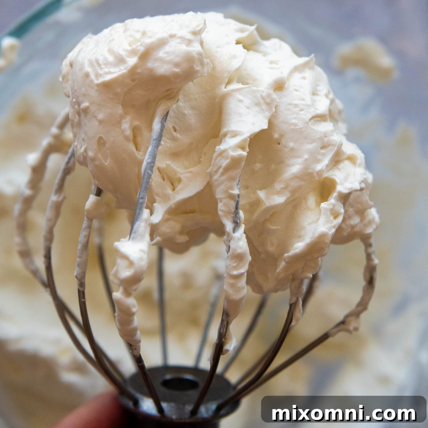 whip cream frosting on a beater,