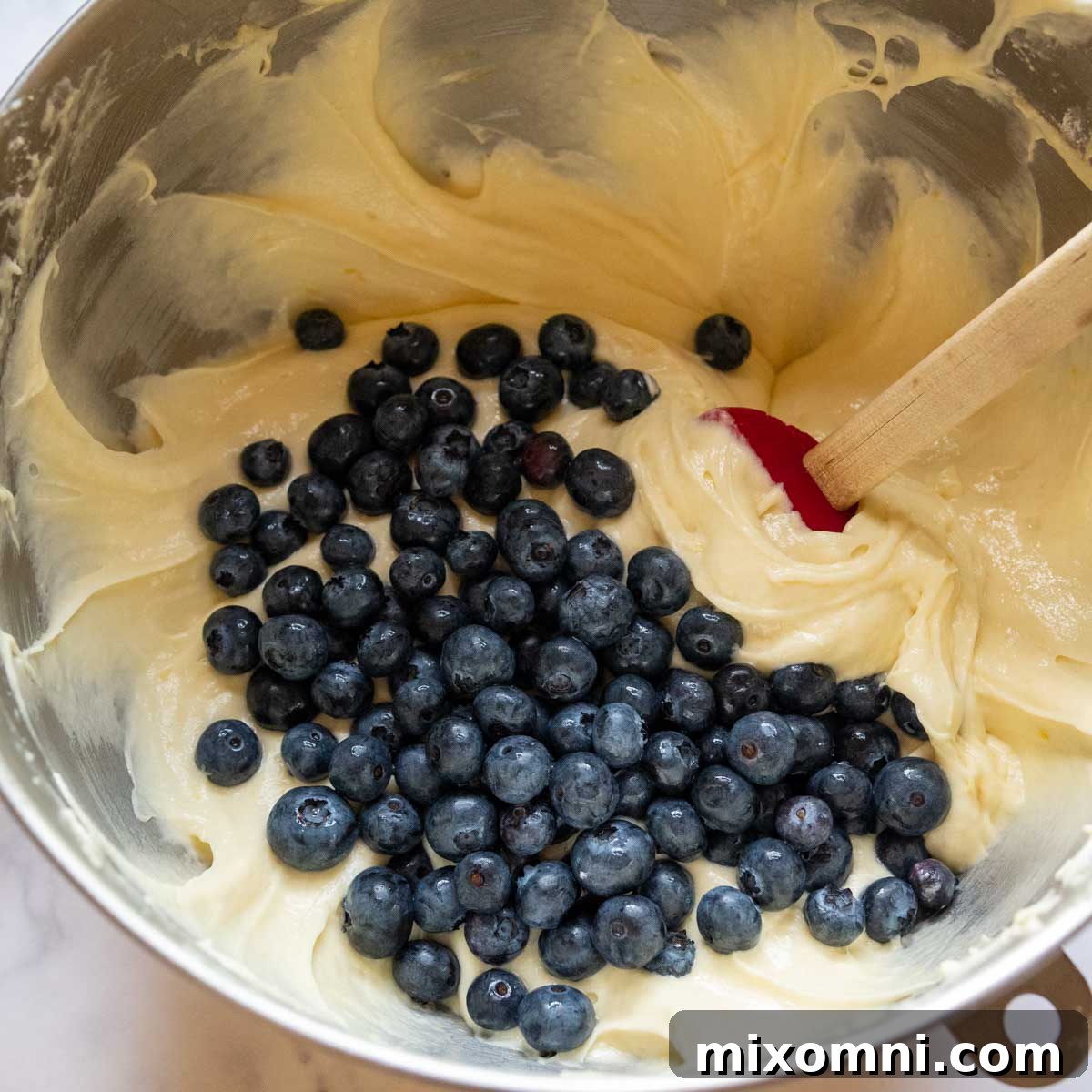 blueberries stirred in the mixture